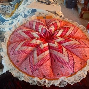 Homemade quilted raspberry wall hanging